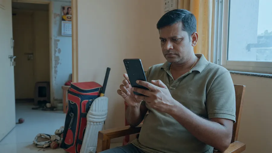 Adult adjusting Android install settings carefully